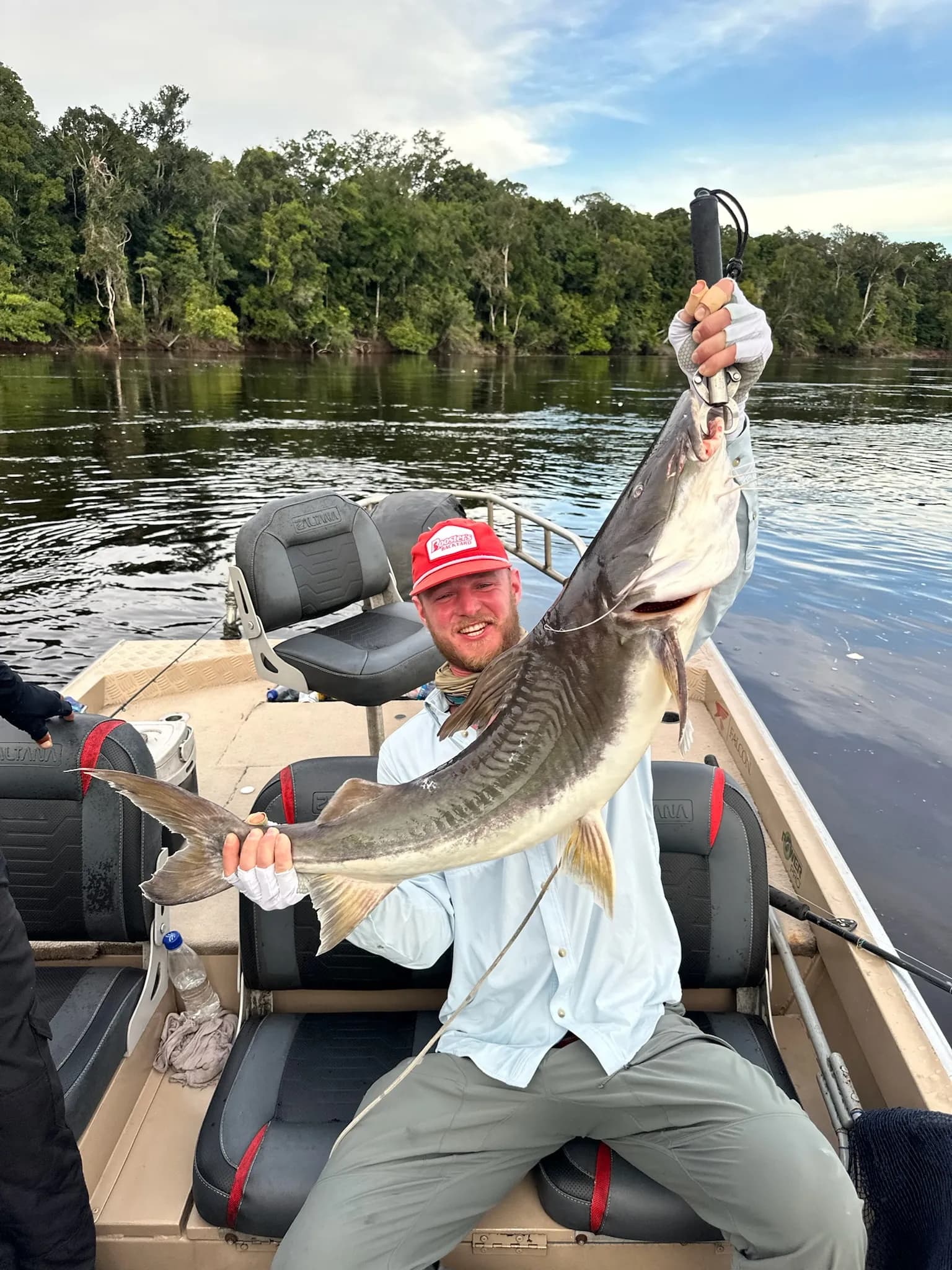 Young guest enjoying an Amazon fishing moment