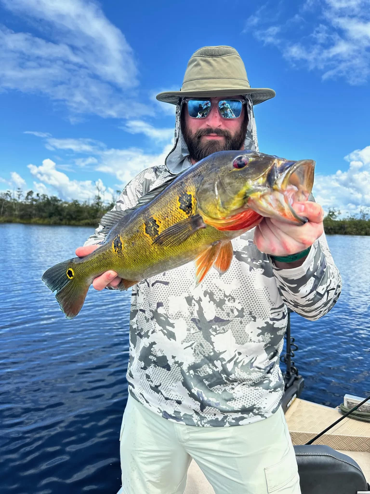 Parents sharing an Amazon fishing adventure