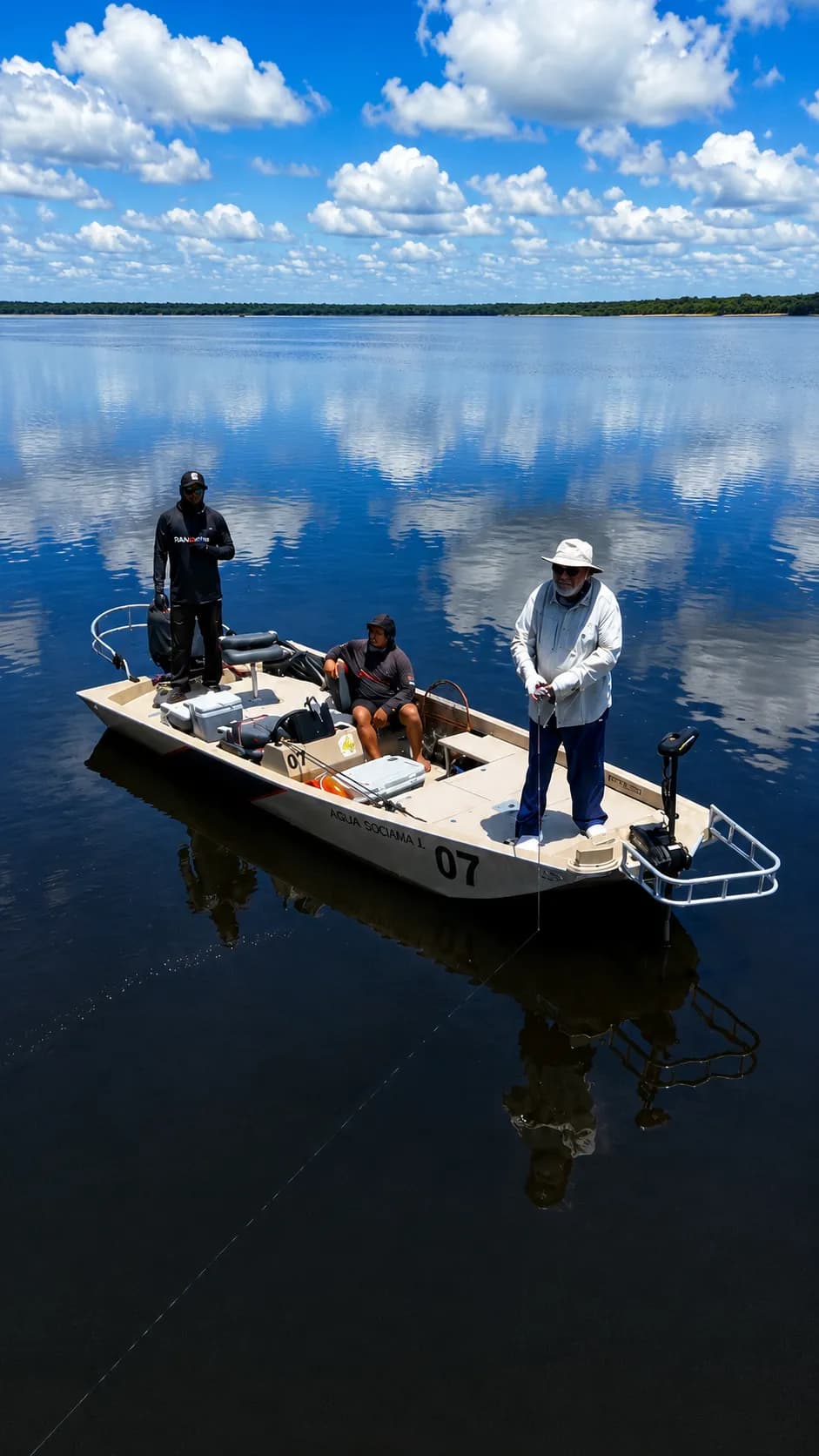 Corporate retreat guests traveling by boat into the Amazon