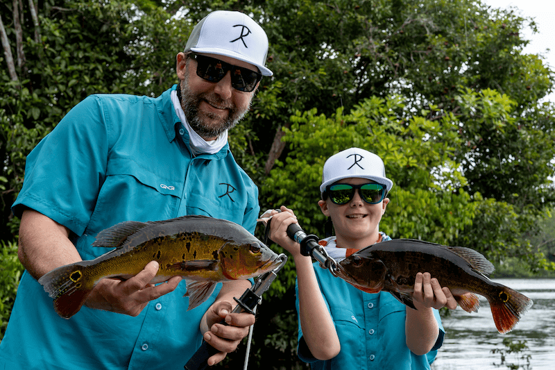 Family and friends enjoying an Amazon fishing adventure