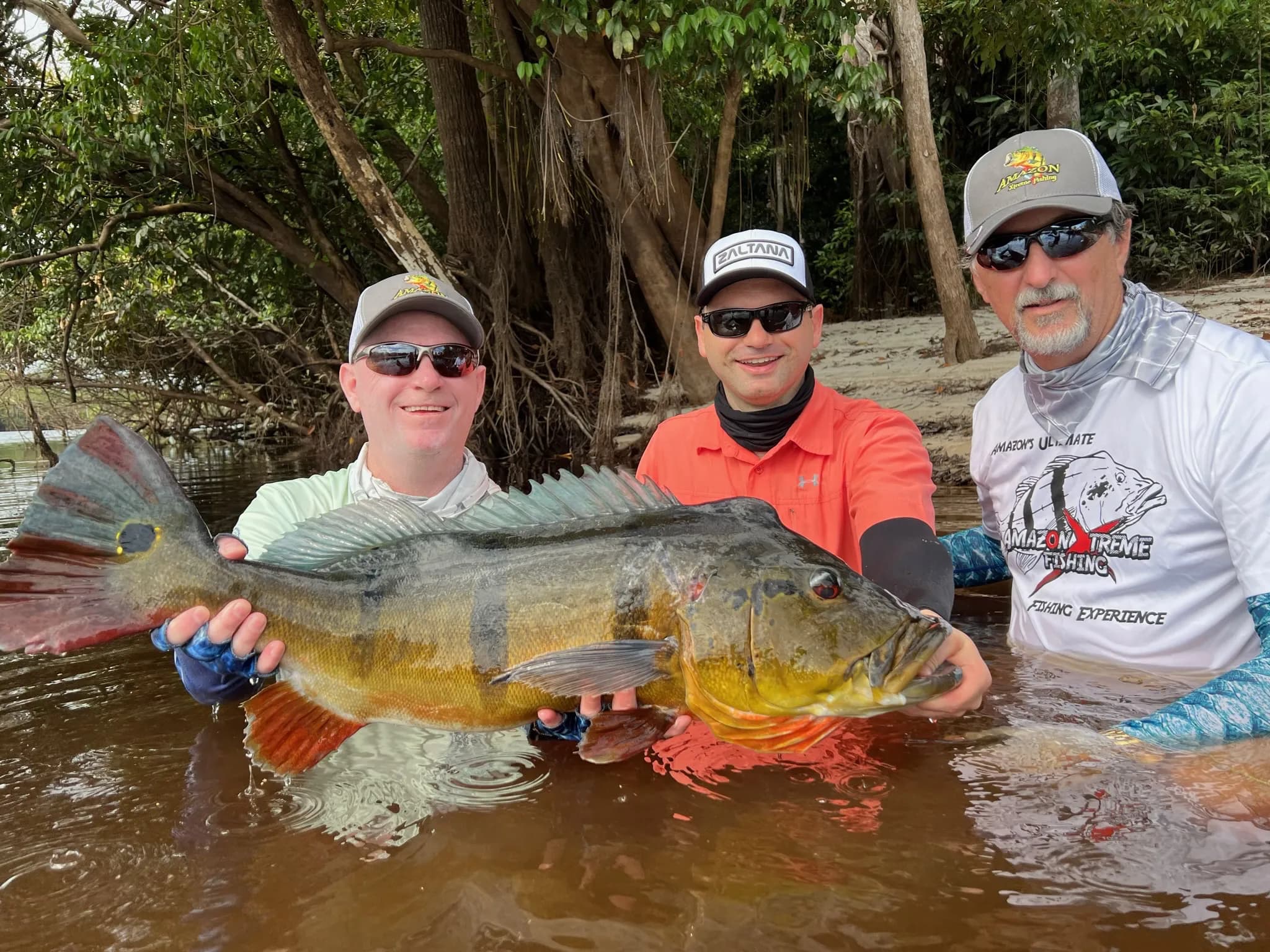 Friends traveling together by boat through the Amazon
